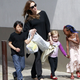 Illustration for article titled Pax Jolie-Pitt Has Attitude; Zahara Jolie-Pitt Has Blue Extensions